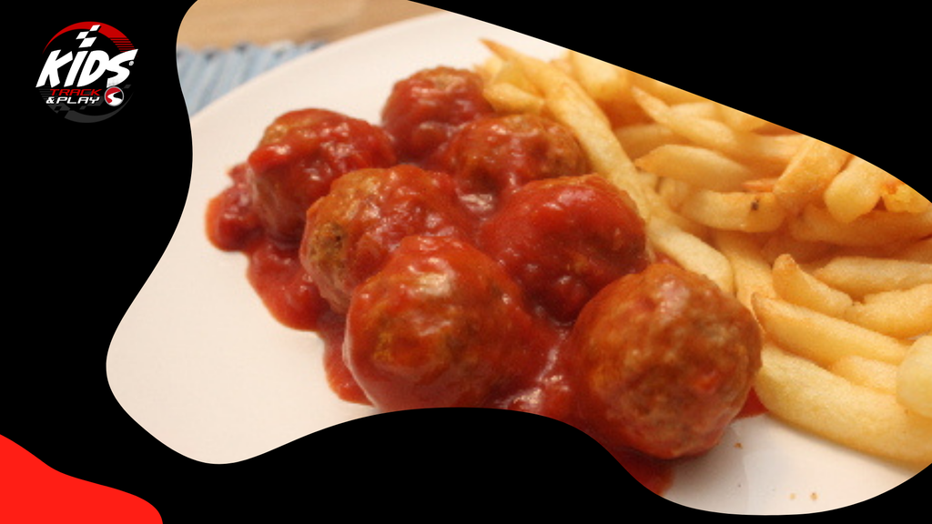 Meatballs in tomato sauce with fries and a drink